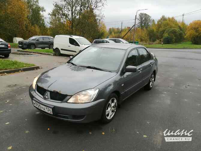 Mitsubishi Lancer 2009 года 1.6 АКПП серый металлик седан. хорошее тех.сост Санкт-Петербург - изображение 1