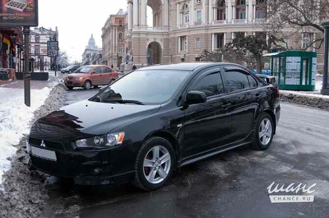 Mitsubishi Lancer 2008 года МКПП черный седан Екатеринбург - изображение 1