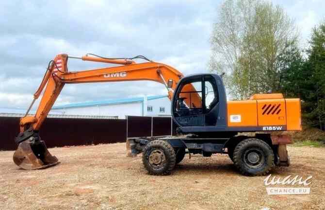 Колесный экскаватор UMG E185W Москва - изображение 1