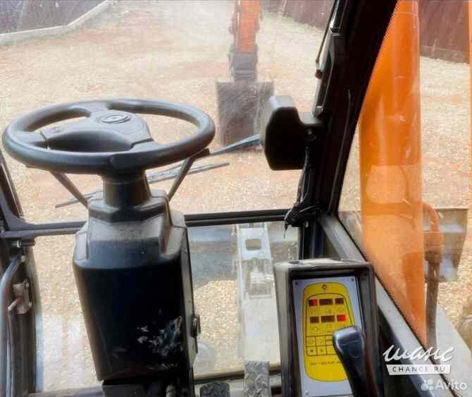 Колесный экскаватор UMG E185W Москва - изображение 8