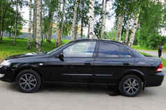 Nissan Almera Classic 2008 года АКПП черный металлик седан