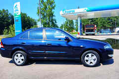 Nissan Almera Классик 2012 года АКПП темно-синий металлик седан